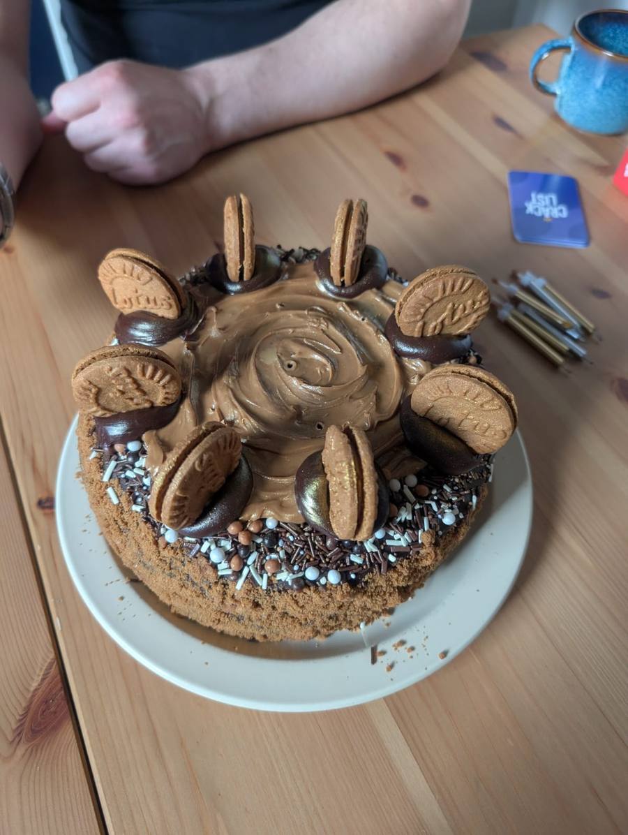 Cake decorated with Biscoff cookies and a Biscoff spread swirl